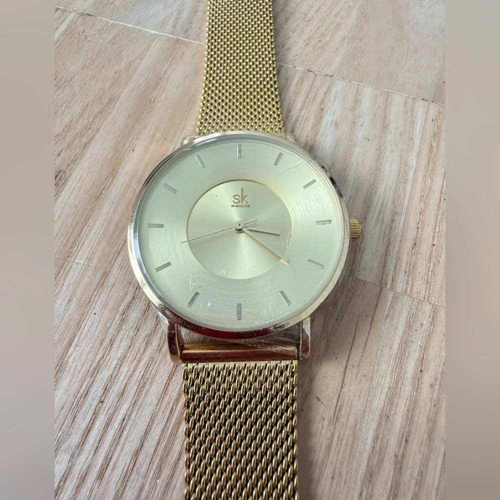 SK shengke ladies gold tone dress watch NEW BATTERY